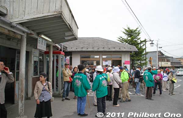 Visitors in front of the old Hino Station and tourist information office