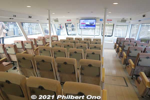 Well-heated and roomy boat interior with large windows. Sit anywhere you want.