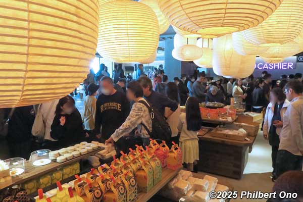 paper lanterns lighting the product shelves